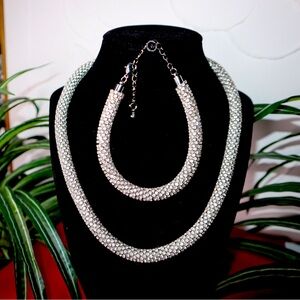 Diamond crusted “luxury” necklace and bracelet set.